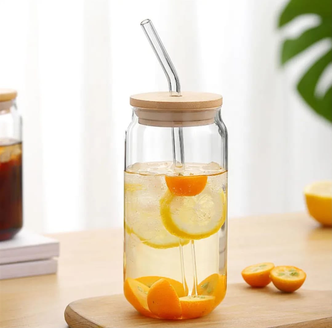 Glass jar with straw