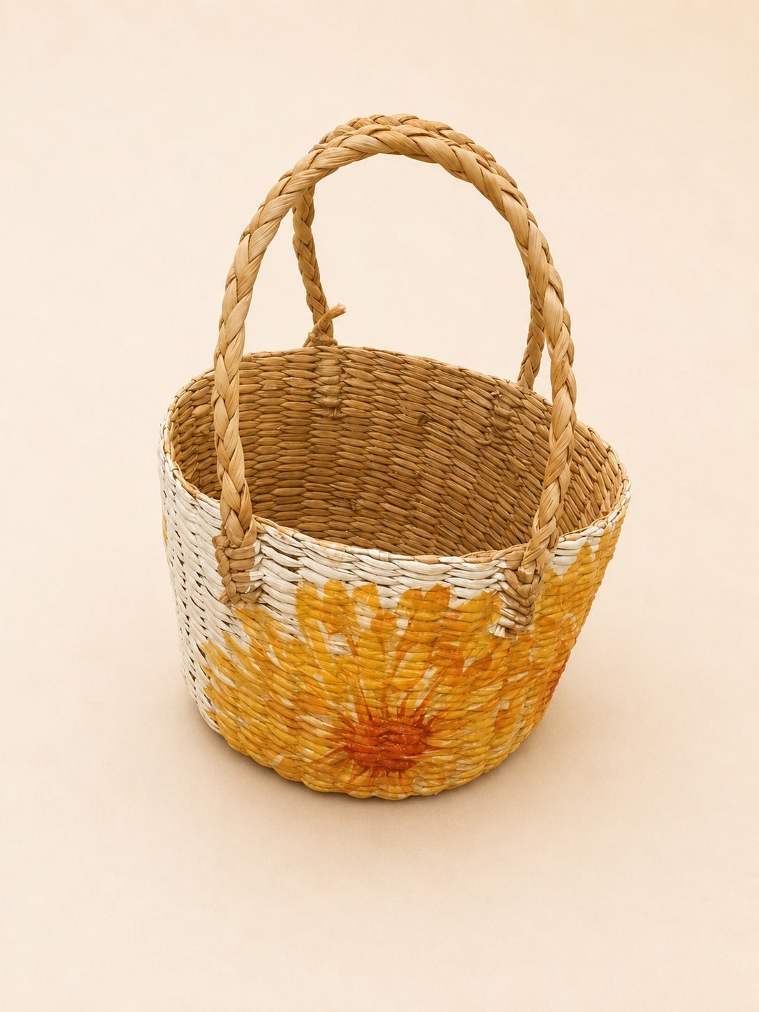 Handwoven Natural Fiber Basket with Braided Handle